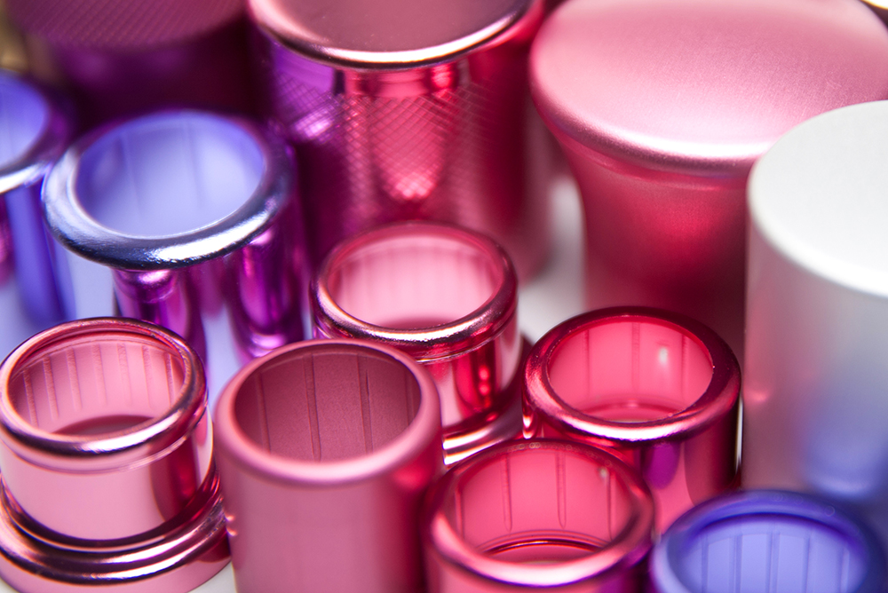 World-class anodised aluminium caps and shrouds in a group for the cosmetic and fragrance industries