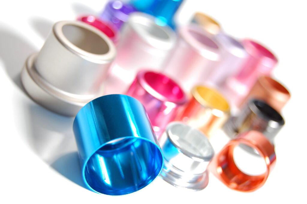 World-class anodised aluminium caps and shrouds in a group for the cosmetic and fragrance industries